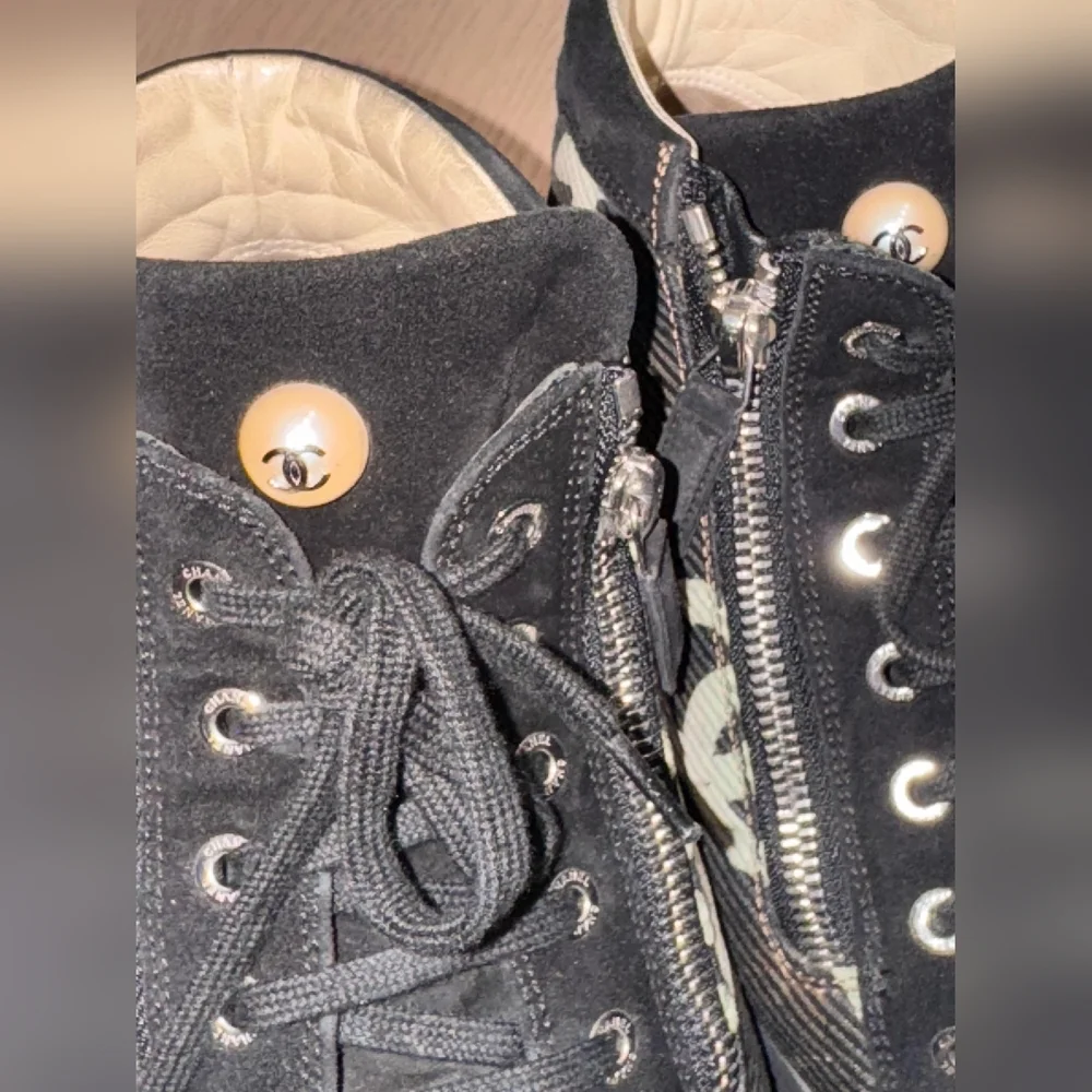 CHANEL Black High-Top Sneakers with Star Design
